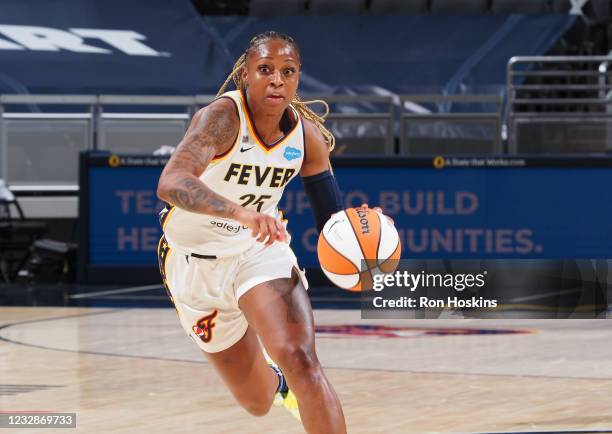 Tiffany Mitchell of the Indiana Fever handles the ball against the Chicago Sky at Bankers Life Fieldhouse on May 3, 2021 in Indianapolis, Indiana....