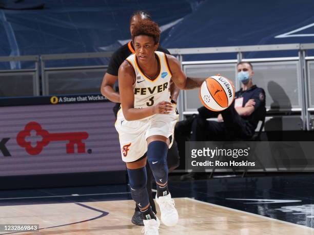 Danielle Robinson of the Indiana Fever handles the ball against the Chicago Sky at Bankers Life Fieldhouse on May 3, 2021 in Indianapolis, Indiana....