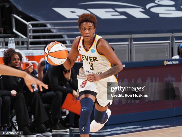 Danielle Robinson of the Indiana Fever handles the ball against the Chicago Sky at Bankers Life Fieldhouse on May 3, 2021 in Indianapolis, Indiana....