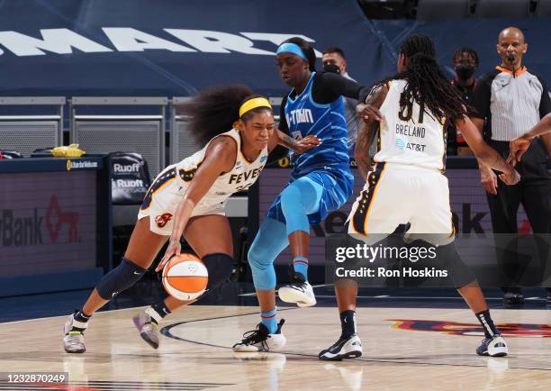 Victoria Vivians of the Indiana Fever handles the ball against the Chicago Sky at Bankers Life Fieldhouse on May 3, 2021 in Indianapolis, Indiana....