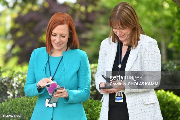 White House Press Secretary Jen Psaki and White House Communications Director Kate Bedingfield not wearing masks after listening to US President Joe...