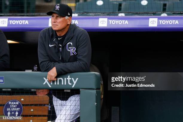 Manager Bud Black of the Colorado Rockies looks on from the dugout during the first inning against the Cincinnati Reds at Coors Field on May 13, 2021...