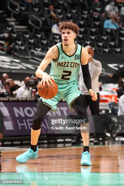 LaMelo Ball of the Charlotte Hornets dribbles the ball during the game against the LA Clippers on May 13, 2021 at Spectrum Center in Charlotte, North...