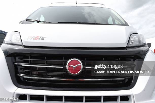 Picture taken in the factory plant of the Pilote group, in Longuenee-en-Anjou, western France, on May 05 shows the logo on the grille of a motorhome...