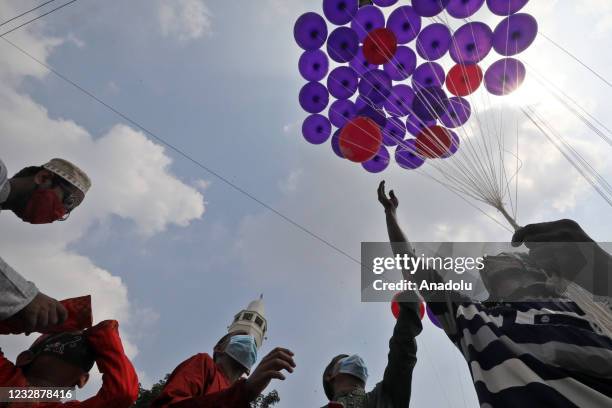 Bangladeshi Muslims gather to celebrate Eid Al-Fitr festival during a lockdown following the COVID-19 coronavirus pandemic in Dhaka, Bangladesh on...