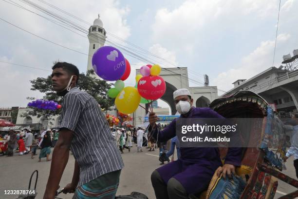 Bangladeshi Muslims gather to celebrate Eid Al-Fitr festival during a lockdown following the COVID-19 coronavirus pandemic in Dhaka, Bangladesh on...