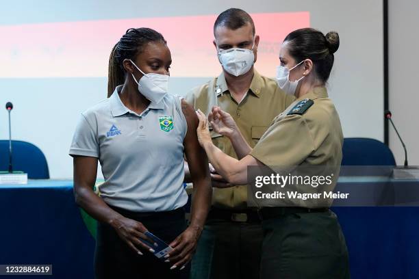 Brazilian track and field sprint athlete Rosângela Santos receives the first dose of Pfizer vaccine as part of the anti COVID-19 vaccination of...