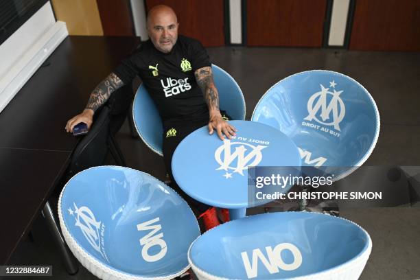 Olympique de Marseille's Argentine head coach Jorge Sampaoli poses for a photo before a press conference at the training ground and academy 'La...