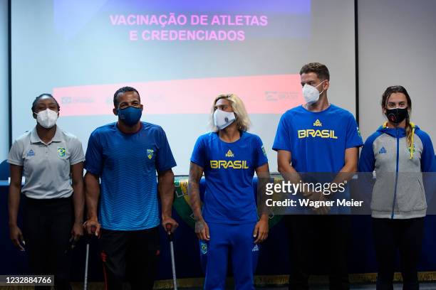 Brazilian athletes Rosângela Santos, Michel Pessanha, Ana Marcela Cunha, Marcus Vinícius D Almeida and Larissa de Oliveira pose for a photo after...