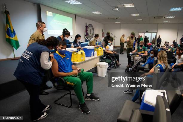 Brazilian athletes receives the first dose of Pfizer vaccine as part of the anti COVID-19 vaccination of Brazilian athletes who will participate in...