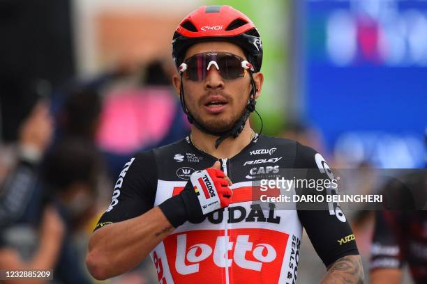 Team Lotto-Soudal rider Australia's Caleb Ewan celebrates as he crosses the finish line to win the seventh stage of the Giro d'Italia 2021 cycling...