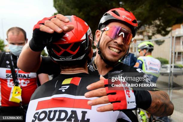 Team Lotto-Soudal rider Australia's Caleb Ewan celebrates with Team Lotto-Soudal rider Belgium's Jasper De Buyst at the finish line after winning the...