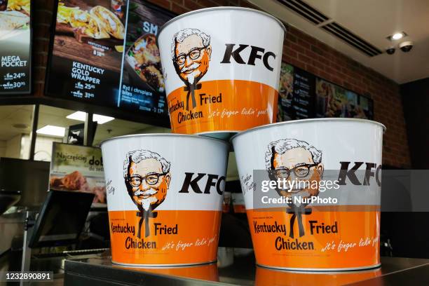 Bucket with Colonel Harland Sanders is seen at KFC restaurant in Krakow, Poland on May 12, 2021.