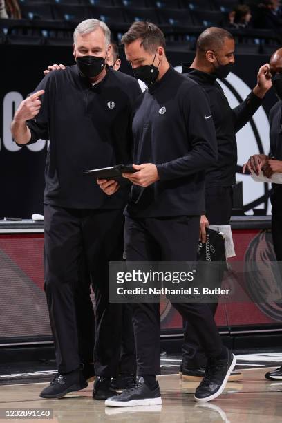 Assistant Coach, Mike D'Antoni talks with Head Coach Steve Nash of the Brooklyn Nets during the game against the Boston Celtics on April 23, 2021 at...