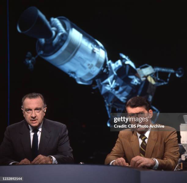 From left is CBS News reporter Walter Cronkite and NASA astronaut Wally Schirra, consultant and co-anchor on the broadcast. Grumman Aerospace at...