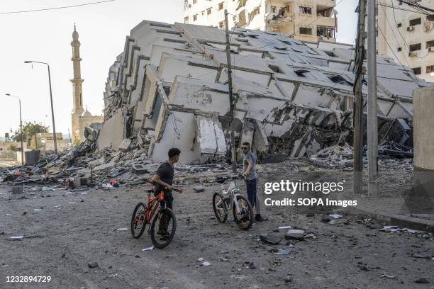 The rubble of the Hanadi tower in the aftermath of overnight Israeli airstrikes on Gaza City. In response to days of violent confrontations between...