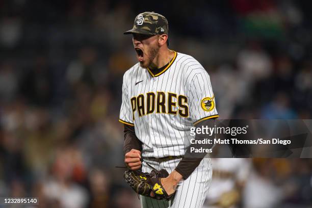 Joe Musgrove of the San Diego Padres celebrates after a double play to close out the third inning against the St Louis Cardinals at Petco Park on May...