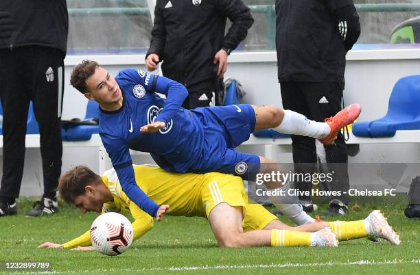 Harvey Vale of Chelsea takes a tumble during the U18 Premier League match between Chelsea and Fulham at Chelsea Training Ground on May 15, 2021 in...