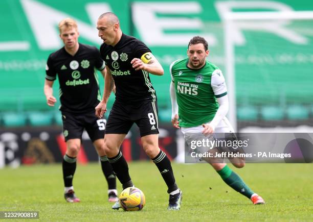 Celtic's Scott Brown and Hibernian's Drey Wright battle for the ball during the Scottish Premiership match at Easter Road, Edinburgh. Picture date:...