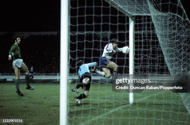 Malcolm MacDonald of England scores past West Germany goalkeeper Sepp Maier during an International Friendly match at Wembley Stadium on March 12,...