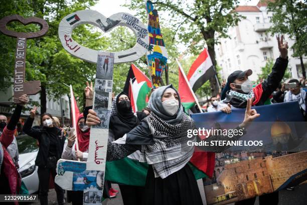 Protesters take part in a pro-Palestinian demonstration on May 15, 2021 in Berlin. - Palestinian militants have launched more than 1,800 rockets...