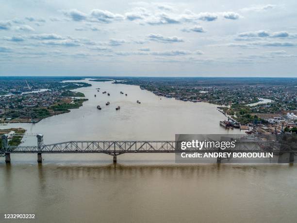 An aerial view taken on May 5, 2021 shows a railway bridge over the Volga river in the city of Astrakhan.