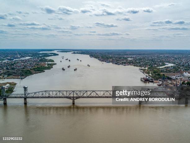 An aerial view taken on May 5, 2021 shows a railway bridge over the Volga river in the city of Astrakhan.