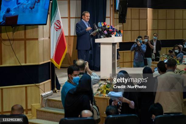 Eshaq Jahangiri , vice president of Hassan Rouhani's government, gestures while speaking with media in the Iranian Interior Ministry building after...