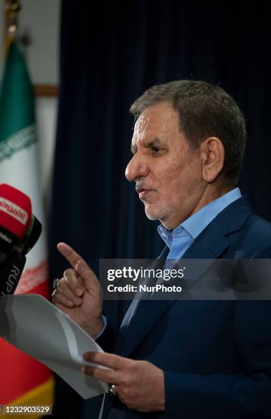 Eshaq Jahangiri, vice president of Hassan Rouhani's government, gestures while speaking with media in the Iranian Interior Ministry building after...