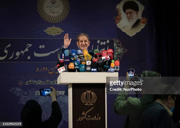 Eshaq Jahangiri, vice president of Hassan Rouhani's government, gestures while speaking with media in the Iranian Interior Ministry building after...