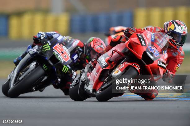 Ducati Team Australian's rider Jack Miller steers his motorbike, ahead Monster Energy Yamaha MotoGP French rider Fabio Quartararo , ahead of the...