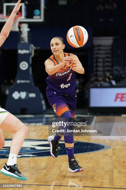 Diana Taurasi of the Phoenix Mercury passes the ball against the Minnesota Lynx on May 14, 2021 at Target Center in Minneapolis, Minnesota. NOTE TO...