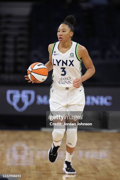 Aerial Powers of the Minnesota Lynx handles the ball against the Phoenix Mercury on May 14, 2021 at Target Center in Minneapolis, Minnesota. NOTE TO...