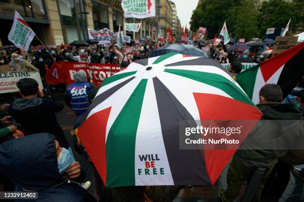 An umbrella at the Palestine colors. Hundreds of people gathered in support of Gaza and the Occupied Territories as a new war seems to have begun...