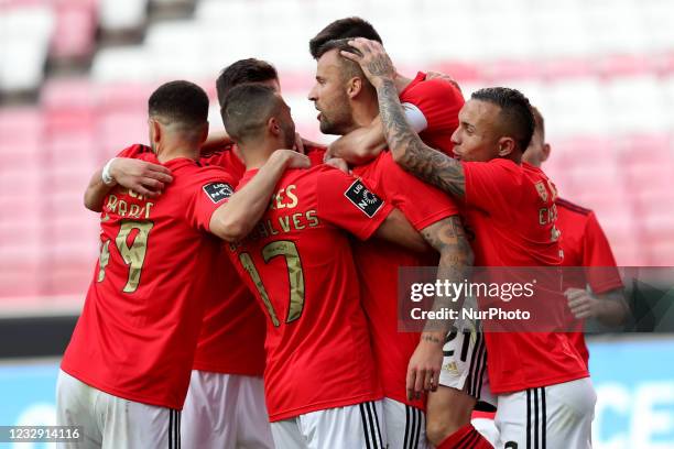 Haris Seferovic of SL Benfica celebrates with teammates after scoring his second goal during the Portuguese League football match between SL Benfica...