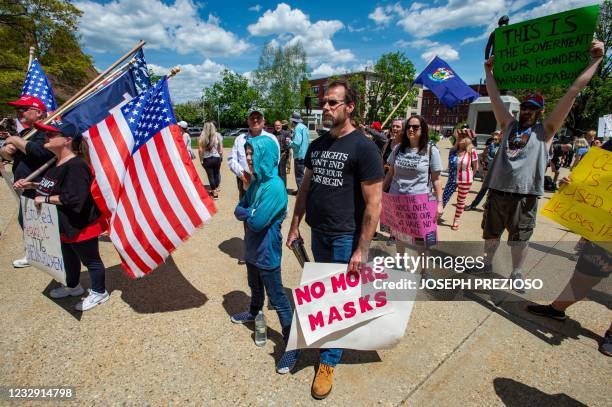 Rally goers protest vaccines and the current administration during the "World Wide Rally for Freedom", an anti-mask and anti-vaccine rally, at the...
