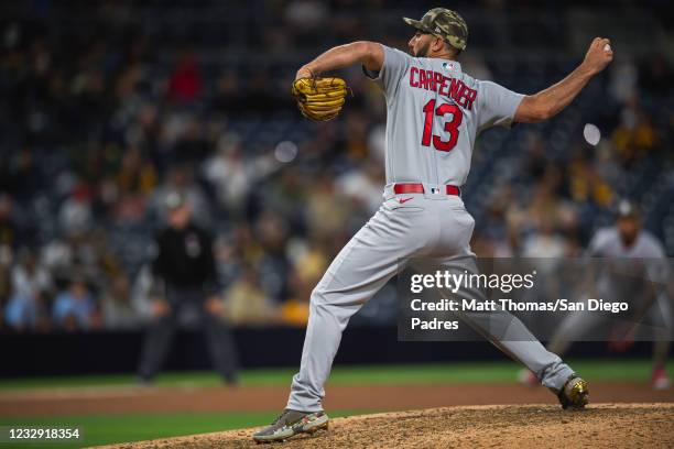 Matt Carpenter of the St Louis Cardinals pitches in the seventh inning against the San Diego Padres at Petco Park on May 15, 2021 in San Diego,...