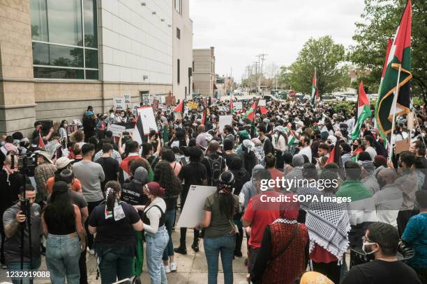 Large crowd gathered during a large free Palestine rally at the Arab American Museum. Hundreds of residents of Detroit and Dearborn Michigan took to...