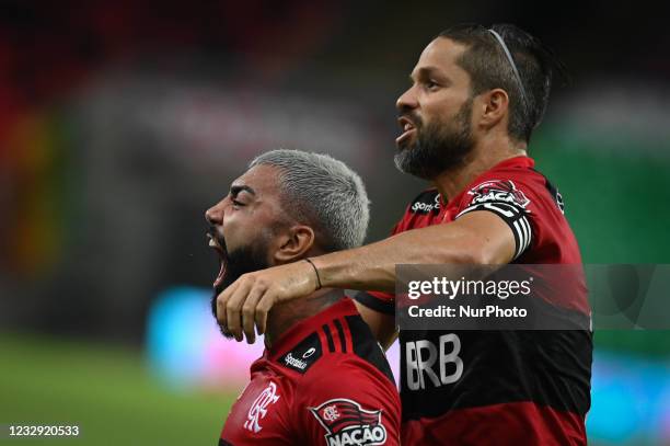 Flamengos Gabriel Barbosa celebrates his goal with his fellow Diego Ribas against Fluminense during the Carioca Championship first round final match...