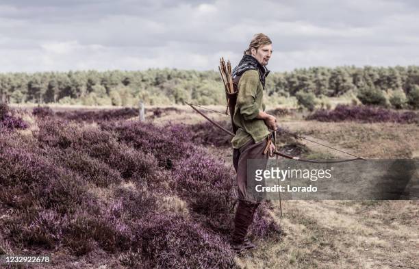 a individual viking archer warrior in the countryside - period costume stock pictures, royalty-free photos & images