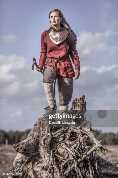 an individual viking female warrior outdoors - historical reenactment stock pictures, royalty-free photos & images