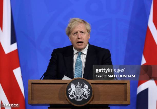 Britain's Prime Minister Boris Johnson gives an update on the coronavirus Covid-19 pandemic during a virtual press conference inside the new Downing...