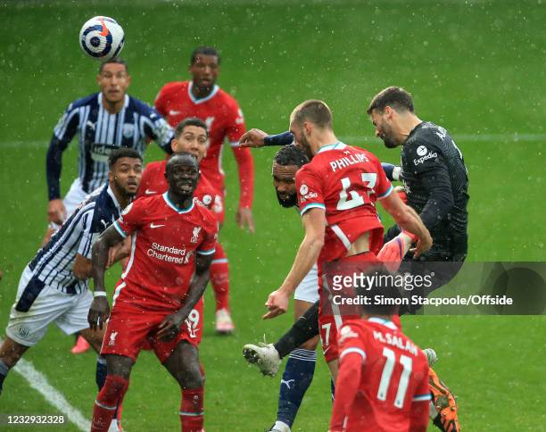Liverpool goalkeeper Alisson Becker scores a last minute goal to give Liverpool a victory over West Brom during the Premier League match between West...
