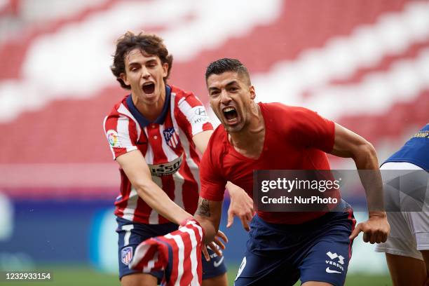 Luis Suarez of Atletico Madrid celebrates after scoring his sides first goal during the La Liga Santander match between Atletico de Madrid and C.A....