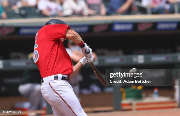 Max Kepler of the Minnesota Twins hits a three run homer in the second inning against the Oakland Athletics at Target Field on May 16, 2021 in...