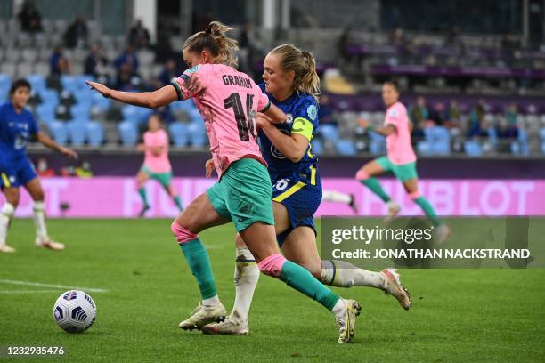 Barcelona's Norwegian forward Caroline Graham Hansen and Chelsea's Swedish defender Magdalena Eriksson vie for the ball during the UEFA Women's...