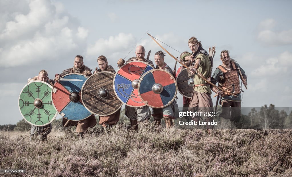 Weapon wielding viking warriors in formation
