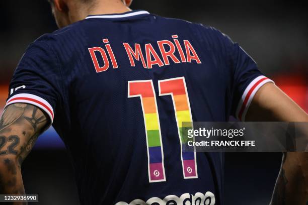 Paris Saint-Germain's Argentinian midfielder Angel Di Maria, wearing a jersey in the colour of the Rainbow flag marking the fight against homophobia,...