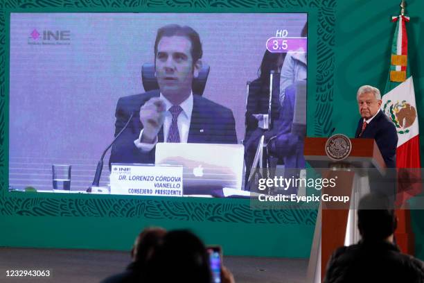 Mexico's President Andres Manuel Lopez Obrador, during his daily morning conference while meets the media, shows a video of the president of the...