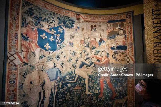 Tapestry showing wrestling at the Field of Cloth of Gold 1520 containing 'The Black Trumpeter' on display during a press preview for the 'Gold and...